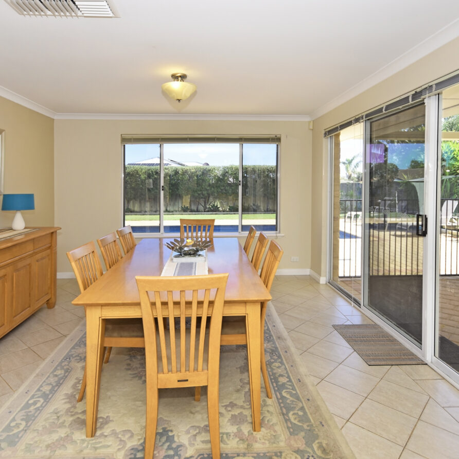Dining area with views out to pool and alfresco  perth holiday stays Dining area with views out to pool and alfresco