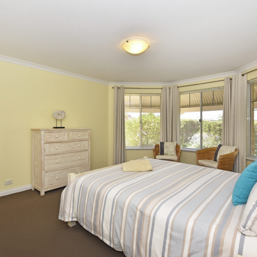 Master bedroom with queen bed and a super bay window  perth holiday stays Master bedroom with queen bed and a super bay window