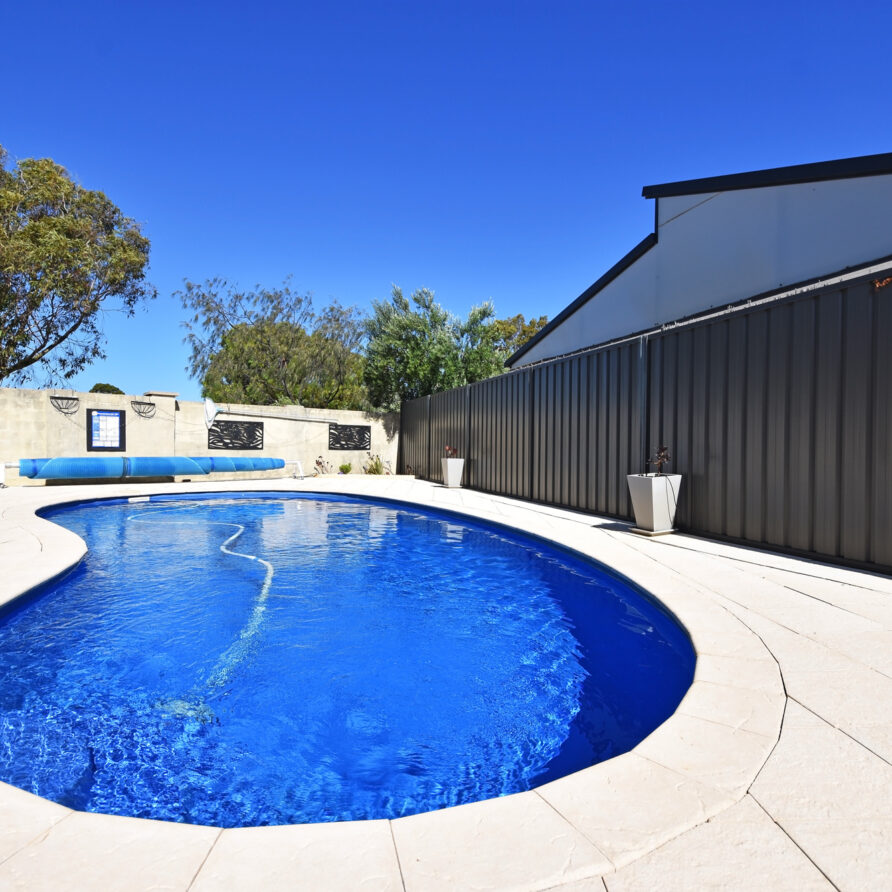 Sparkling below ground pool  perth holiday stays Pool area