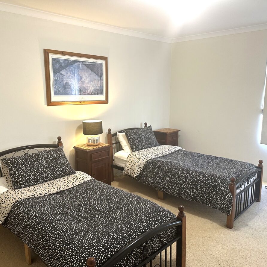 Bayport bedroom two with two single beds taken july 2025  perth holiday stays Bedroom three with two single beds